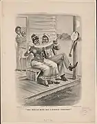 Couple sharing watermelon, banjo hangs nearby