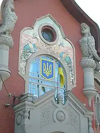 Alkonosts on frontage of the House of Noble and Peasant Bank&nbsp;[uk] in Poltava, Ukraine (1906-1909, burned in 1943, restored in 1948)