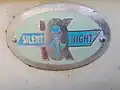 Silent Knight brand badge on an upright refrigerator