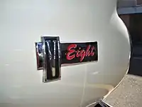 V-Eight badge as fitted to Chrysler AP6 Valiant V8 front guards and to wagon tailgates