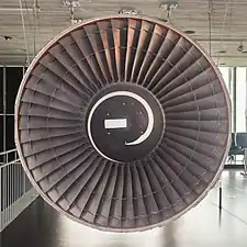 1960's Pratt & Whitney JT9D 92 inch diameter fan with long, narrow blades known as high aspect ratio. This type of blade was designed assuming the airflow was two-dimensional, ie along a chord line with no mass, momentum or energy exchanged along the length of the blade. They were superseded by wide chord blading when CFD was introduced which models the real flow around blades which is 3-dimensional.