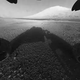 Curiosity landed on August 6, 2012, about 10 km from the base of Mount Sharp).
