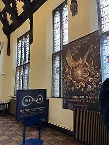 The hall: stained glass windows on east wall.