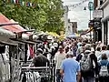 Shoppers and stalls on St Peter’s Street at St Albans Market.