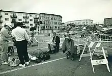 Image 21A journalist works on location at the Loma Prieta Earthquake in San Francisco's Marina District October 1989. (from Broadcast journalism)