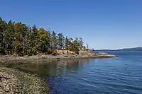 A small point of land jutting out into the ocean