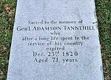 Photograph of tombstone. Engraved text reads "Sacred to the memory of / Gen'l Adamson Tannehill / who / after a long life spent in the / service of his country / expired / Dec. 23rd, 1820 / aged 71 years."