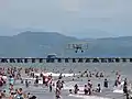 Image 7Beachgoers and an air show at Puntarenas, 2013