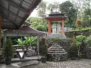 Altar and statue of the Holy Family in the Prayer Garden.