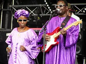 Image 17Malian musical duo Amadou et Mariam are known internationally for their music, combining Malian and international influences. (from Culture of Mali)