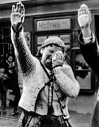 Image 5German occupation of CzechoslovakiaPhoto credit: Völkischer BeobachterA crying Sudeten woman salutes Adolf Hitler as German forces sweep into Czechoslovakia, October 1938. Originally published in the Völkischer Beobachter, it supposedly showed the intense emotions of joy which swept the populace as Hitler drove through the streets of Cheb, 99% of whose inhabitants were ardently pro-Nazi Sudeten Germans at the time. In contrast, when the photo was published in the U.S., it was captioned, "The tragedy of this Sudeten woman, unable to conceal her misery as she dutifully salutes the triumphant Hitler, is the tragedy of the silent millions who have been 'won over' to Hitlerism by the 'everlasting use' of ruthless force." It is unknown what the true circumstances surrounding the photo are.More featured pictures