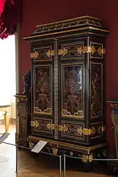 Baroque cupboard; by André Charles Boulle; c.1700; ebony and amaranth veneering, polychrome woods, brass, tin, shell, and horn marquetry on an oak frame, gilt-bronze; 255.5 x 157.5&nbsp;cm; Louvre