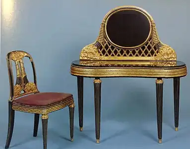 Dressing table and chair, a reinterpretation of the Louis XVI style; by Paul Follot; 1919; marble and encrusted, lacquered, and gilded wood; unknown dimsensions; Musée d'Art Moderne de Paris