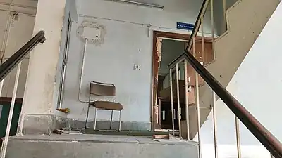 Broken gate of reading hall after the police attack on the evening of 15 December 2019.