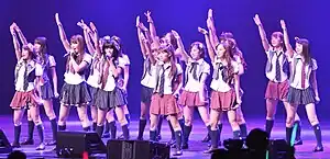 AKB48 performing at the  Nokia Theater (now Peacock Theater) in Los Angeles, California, July 2010