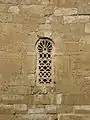 Visigothic window with stone tracery, of Church of San Juan Bautista, Baños de Cerrato, 7th century