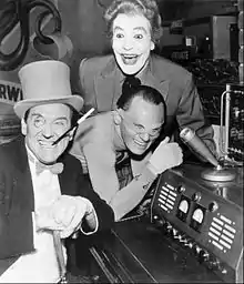 Burgess Meredith as The Penguin (left), Frank Gorshin as The Riddler (center), and Cesar Romero as The Joker (top)