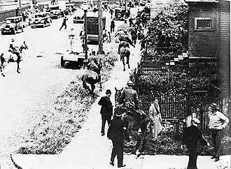 Image 4Mounted police chase demonstrators through Vancouver's East End during the Battle of Ballantyne Pier in 1935.