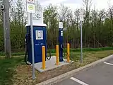 A charging site in Quebec, Canada with a 50&nbsp;kW CHAdeMO / CCS "combo" DC fast charger and a Level 2 AC connector.