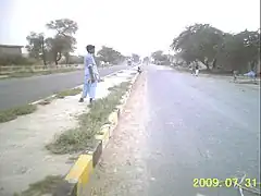 Locals playing tape ball gully cricket in Pakistan