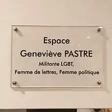 Plaque saying "Espace Genevieve PASTRE: Militante LGBT, Femme de lettres, Femme politique"