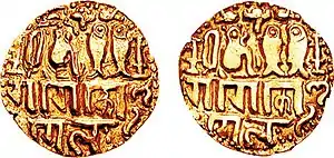 Imperial coin of Emperor Rajaraja I (985–1014). Uncertain Tamil Nadu mint. Legend "Chola, conqueror of the Gangas" in Tamil, seated tiger with two fish. of Chola empire