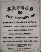 This inscription on white marble is in memory of an officer killed by a tiger at the village of Maine (now known as Men), south of Mhow.