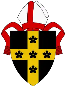 Sable, a cross Or with five cinquefoils sable