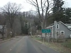 Signage entering Cold Brook via Herkimer County Route 224, approaching New York State Route 8