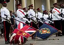 Colour party of the Royal Bermuda Regiment at Queen's Birthday Parade on Front street (at its intersection with Burnaby Street) on 10 June 2017