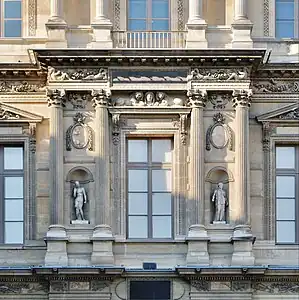 Renaissance medallion with marble plaques on the north facade of the Cour Carrée of the Louvre Palace, designed by Pierre Lescot, 16th century