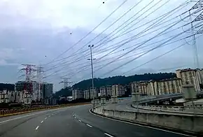 DASH Highway at Kota Damansara section heading westbound with the national grid lines above it.jpg