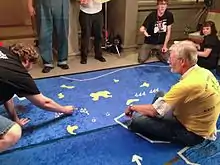 Mike Carr (in yellow) running Don't Give Up the Ship! at Gen Con Indy 2013.