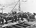 This 1904 photograph pictures the official laying of the cornerstone in Dunoon Scotland, of the Dunoon Pavilion, which was designed by Scottish architect William Fraser, ARIBA, who is pictured first on the left wearing a top hat. Private Collection.