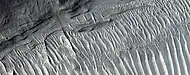Close view of layers, as seen by HiRISE under HiWish program   A ridge cuts across the layers at a right angle.