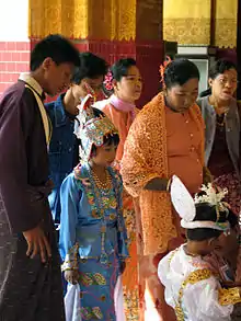 Image 6An ear-piercing ceremony at Mahamuni Buddha in Mandalay. (from Culture of Myanmar)