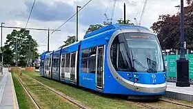 Urbos 3 tram in West Midlands Metro livery at Edgbaston Village tram stop