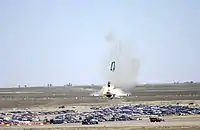 Image 7At the Mountain Home Air Force Base in Elmore County, Southwestern Idaho in September 2003 Capt. Christopher Stricklin ejected from the USAF Thunderbirds number six aircraft less than a second before it impacted the ground at an air show at the base. Stricklin, who was not injured, ejected after guiding the jet away from the crowd of more than 60,000 people