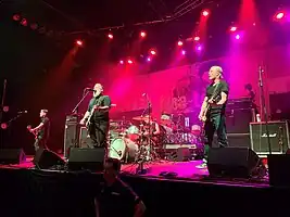 Face to Face performing at the Fillmore Auditorium in Denver, 2022
Left to right: Shiflett, Keith, ex-drummer Parada (behind drum kit), and Hill.