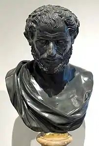 Tentatively identified as Democritus, this portrait from the square peristyle has also been suggested to be Aristotle, Solon, Philopoemen, or Heraclitus.