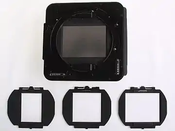 filmside-view of Roll Film Holder IIIN (without Format-Mask in the format 6x8cm) with depicted Format-Masks 6x4.5&nbsp;cm, 6x6cm, 6x7cm for Fuji GX680III Professional