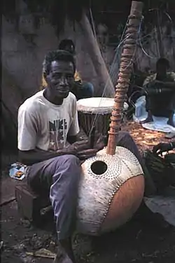 Image 54Master Kora maker Alieu Suso in the Gambia (from Origins of the blues)