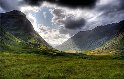 Image 2Glen Coe ((Scottish Gaelic: Gleann Comhann) is a glen in the Highlands. It lies in the southern part of the Lochaber committee area of Highland Council, and was formerly part of the county of Argyll.Photo Credit: Gil.cavalcanti