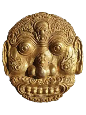 A silver-alloyed gold mask from from East Java, Indonesia, 14th century.