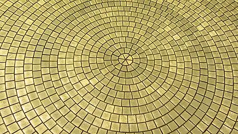 Closeup of one of the golden discs.