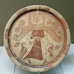 Winged goddess with a Gorgon's head, orientalizing plate, c.600&nbsp;BC, from Kameiros, Rhodes