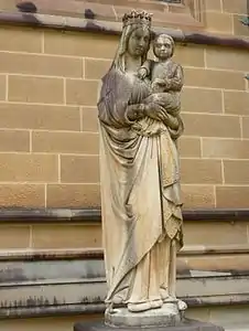 A statue by Fr John Dom Eugene Gourbeillon OSB of "Our Lady and the child Jesus", the only surviving statue from the first cathedral