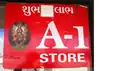 Gujarati and English sign on shop in English-speaking town in America, a Hindu talisman in the Gujarati language
