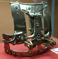 HJRK B 21 - Mechanical breastpiece used for Bundrennen, a tournament type which was probably only organized in the Imperial Court, c. 1490. Only three mechanical breastplates remain (one in Paris, two in Vienna). The breastplate was designed to carry a shield that, when hit properly, will be ejected over the jouster's head and burst apart, releasing triangle tin segments.