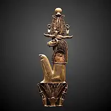 Amulet in the form of Heryshaf seated on a lotus; 1069–332 BC; gold; height: 11.5 cm, width: 3.4 cm; Louvre